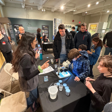 Aleezah talking to a group of guests